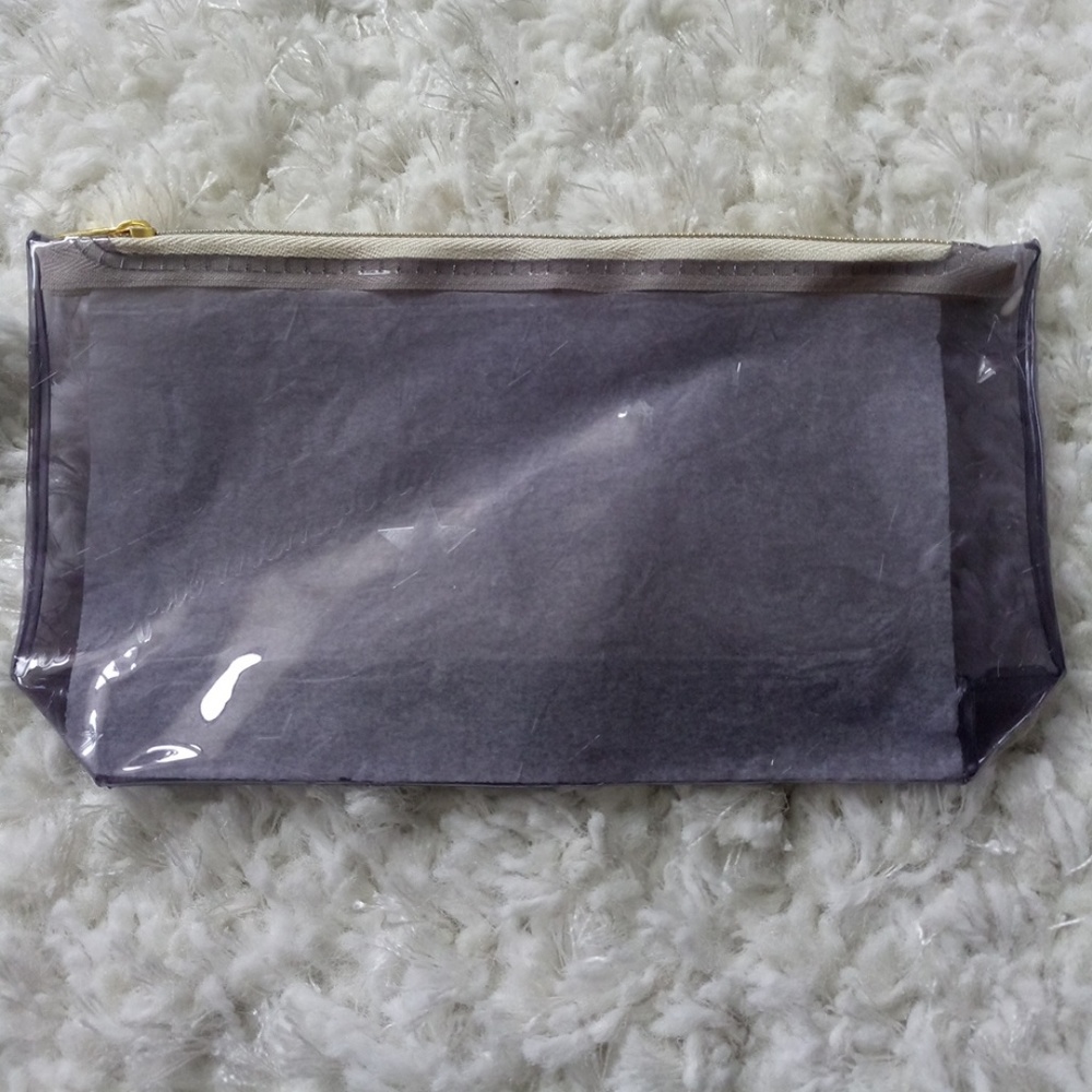 Star Embossed Boat Shaped Pouch